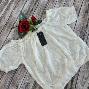 Dynamite— off shoulder white shirt